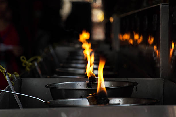 istock Burning Oil Lamp at Wat Yai Chai Mongkhon temple 498494846