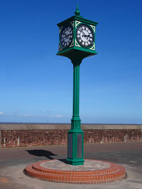 istock Image of seaside Victorian clock tower on Minehead beach promenade 498496410