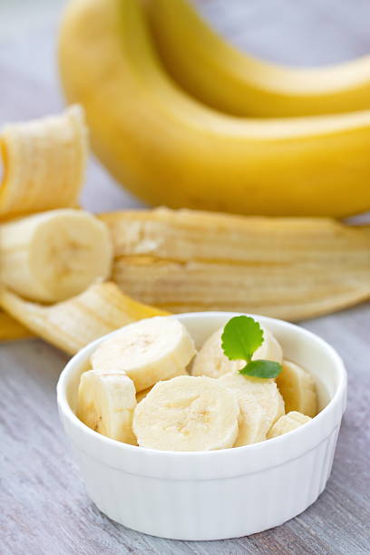 istock Ripe bananas on the wooden table 498498052