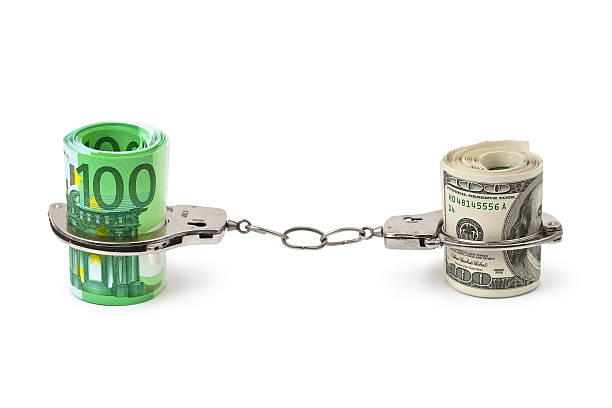 istock Money and handcuffs 498498126