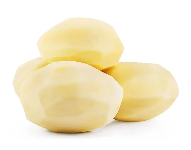 Raw peeled potatoes isolated on white background. Clipping Path