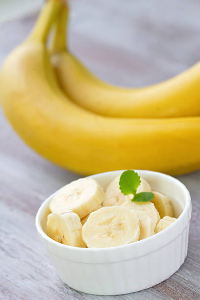 istock Ripe bananas on the wooden table 498498462