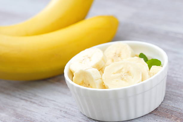 istock Ripe bananas on the wooden table 498498834