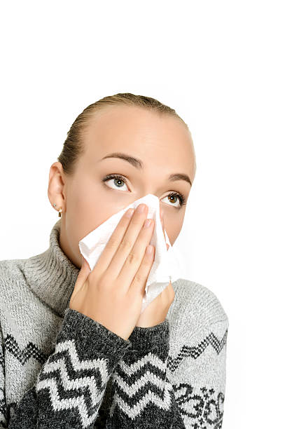 istock ill sneezing girl 498499882