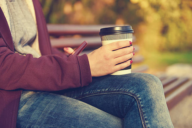 istock hands holding cup of coffee 498503792