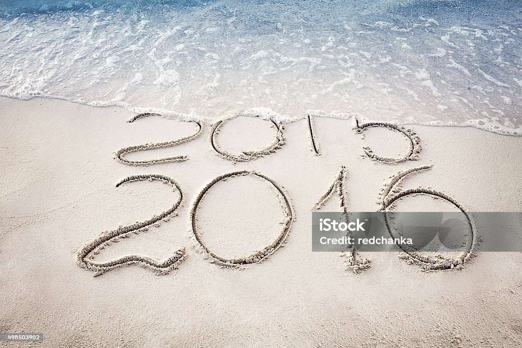 New Year 2016 replace 2015 concept on the sea beach New Year 2016 is coming concept. Happy New Year 2016 replace 2015 concept on the sea beach 2015 Stock Photo