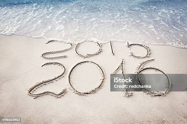 New Year 2016 Replace 2015 Concept On The Sea Beach Stock Photo - Download Image Now