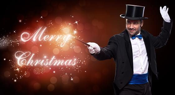 magician with a Christmas magic, trick for Merry Christmas