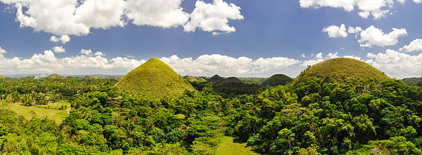 Chocolate Hills XXL Panorama - Bohol, Philippines XXL Panorama stitched together from 9 single pictures.  chocolate hills photos stock pictures, royalty-free photos & images