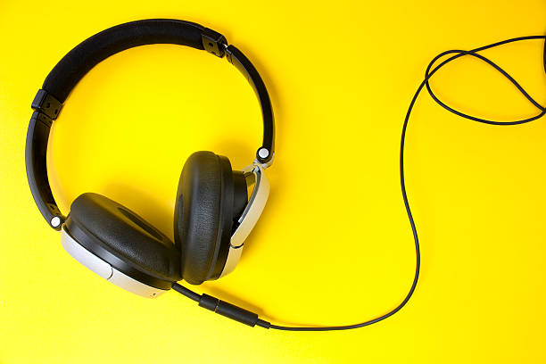 istock headphones on yellow 498508405
