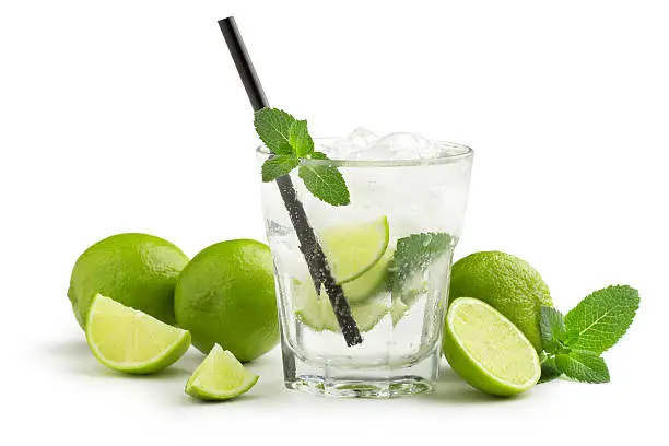 mojito cocktail and fresh ingredients on white background