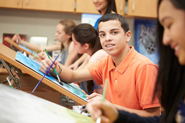 istock Male Pupil In High School Art Class 498512449