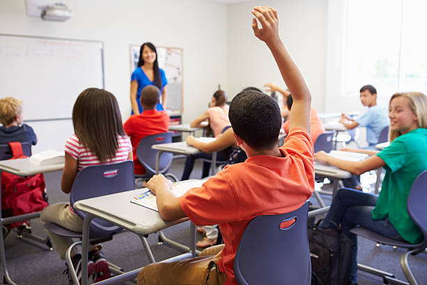 istock Female High School Teacher Taking Class 498512551