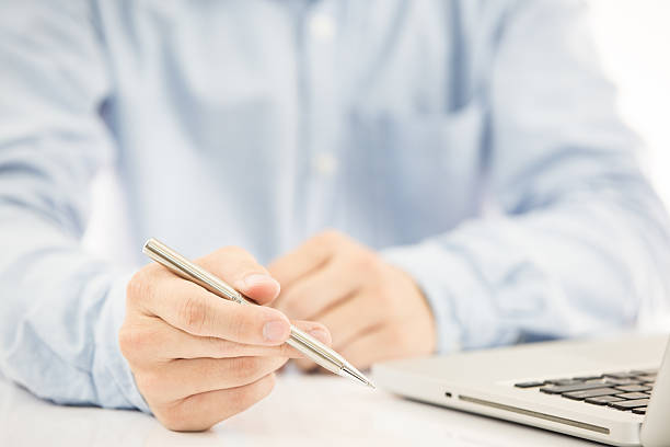 istock Close-up of Businessman using laptop 498524941