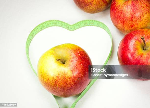 Red Apples With Measuring Tape Forming A Heart Shape Stock Photo - Download Image Now