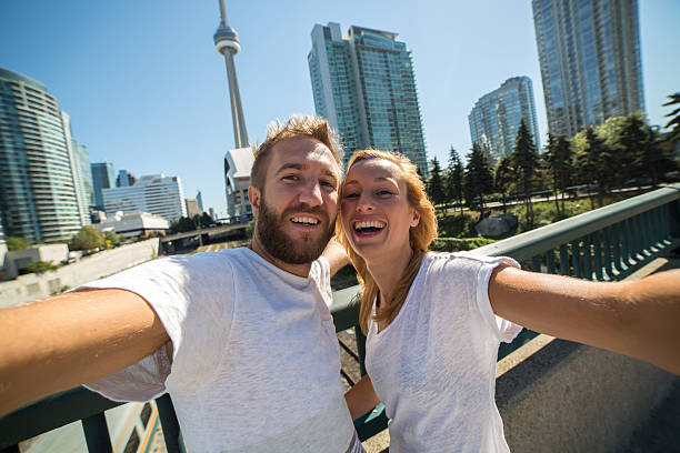 istock Young people taking selfie portrait in Toronto 498525138