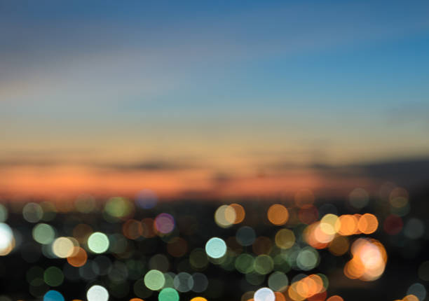 istock Blurred city lights bokeh illuminated at twilight 498526094