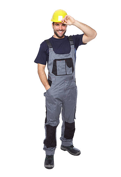 istock Portrait of smiling worker in gray uniform 498527381