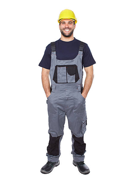 istock Portrait of smiling worker in gray uniform 498527387
