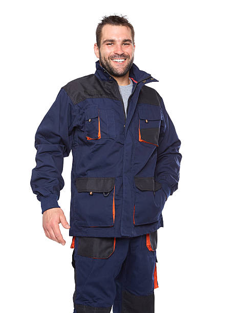 istock Portrait of smiling worker in blue uniform 498527393