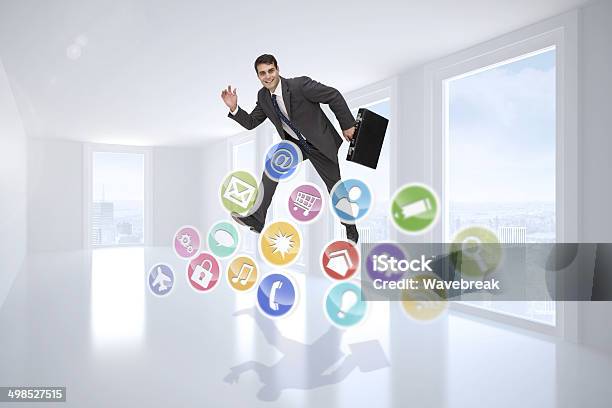 Composite Image Of Cheerful Businessman In A Hurry Stock Photo - Download Image Now - 20-29 Years, Adult, Beautiful People