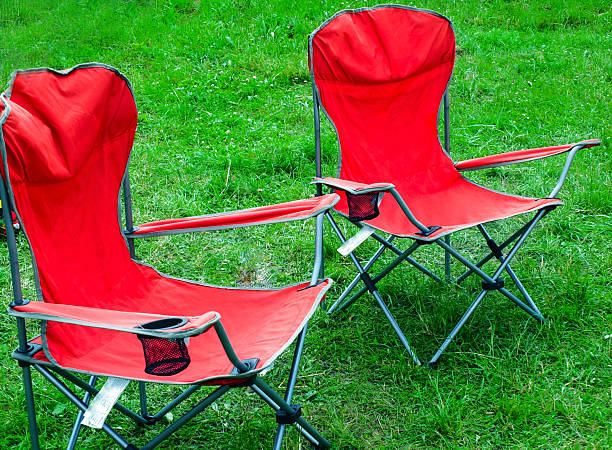 istock folding chairs for outdoor recreation spring grass 498528551