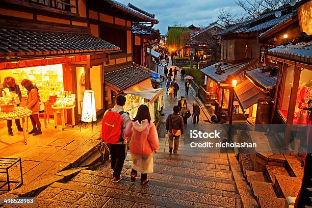 Tourists Walk On A Street Leading To Kiyomizu Temple Stock Photo - Download Image Now