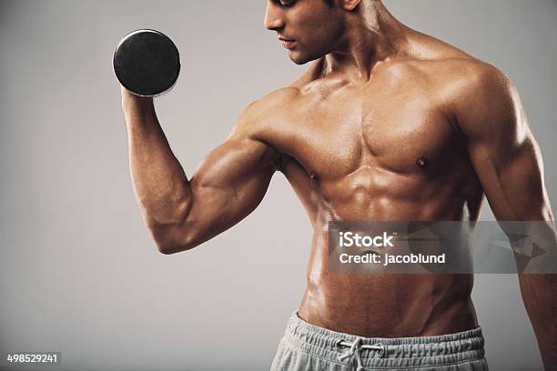 Man Working Out With Dumbbells Stock Photo - Download Image Now - Picking Up, Weight, Weights