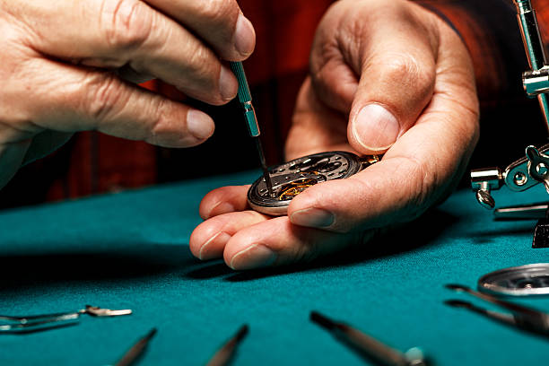 istock Repairing old pocket watch 498529347