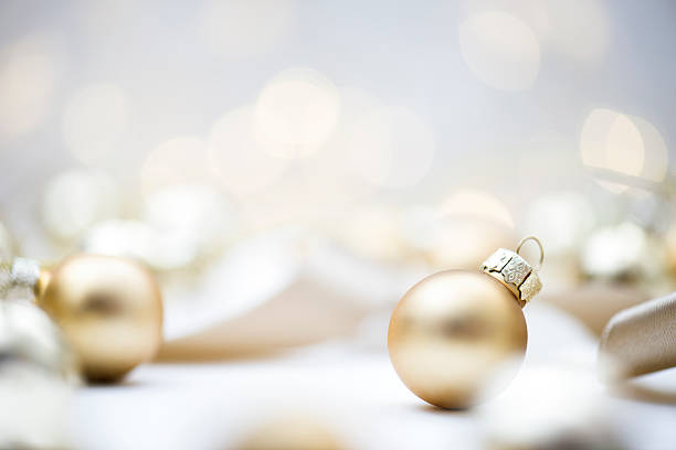 Golden christmas baubles , horizontal