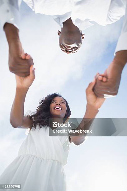 Happy Couple Smiling At Each Other Stock Photo - Download Image Now - 20-29 Years, Adult, Adults Only