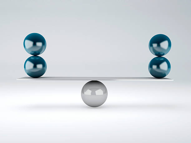 istock blue spheres in equilibrium. Balance concept 498530723