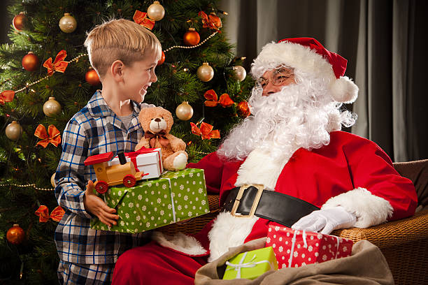 istock Santa Claus and a little boy 498531044