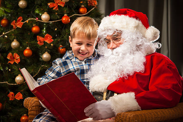 istock Santa Claus and a little boy 498531430