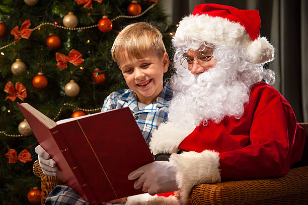 istock Santa Claus and a little boy 498531474