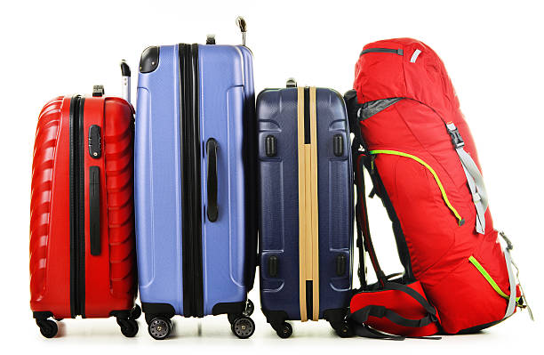 istock Suitcases and rucksack isolated on white 498531477