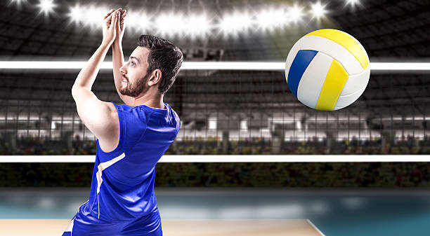 istock Volleyball player on blue uniform on volleyball court 498533520