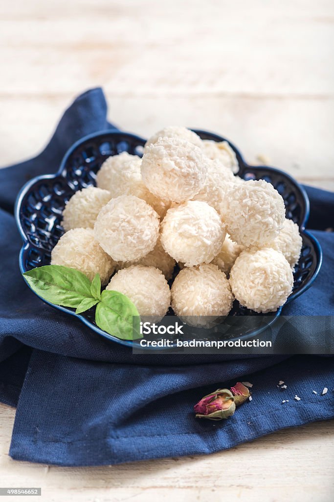 Sweet coconut pralines Sweet coconut pralines in the plate,selective focus 2015 Stock Photo