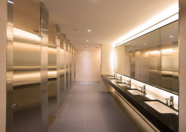 office bathroom the men's room in a corporate headquarters mens room stock pictures, royalty-free photos & images