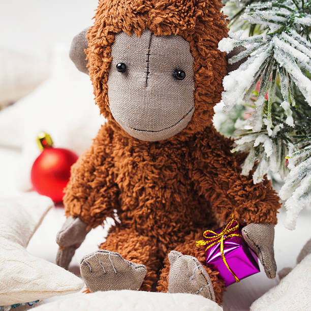 istock Toy Monkey and Christmas decorations 498547850
