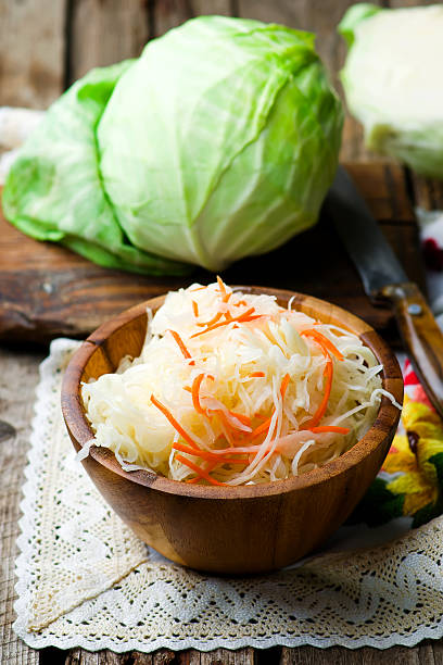 istock sauerkraut in a wooden bowl 498547972