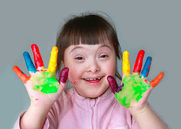 istock Cute little girl with painted hands 498548380