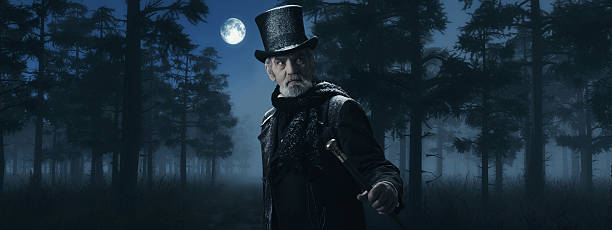 istock Dickens Scrooge Man with Cane in Misty Winter Forest. 498549390