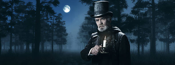 Dickens Scrooge Man with Candlestick in Foggy Winter Forest. Dickens Scrooge Man with Candlestick in Foggy Winter Forest at Moonlight. charles dickens stock pictures, royalty-free photos & images