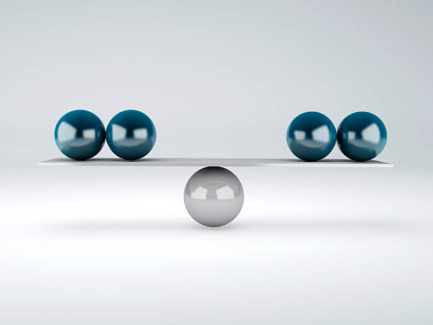istock blue spheres  in equilibrium. Balance concept 498550325
