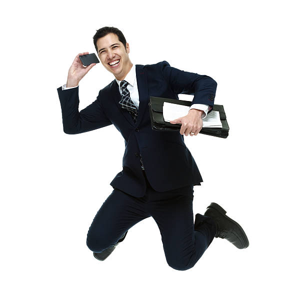 istock Cheerful businessman jumping 498551135