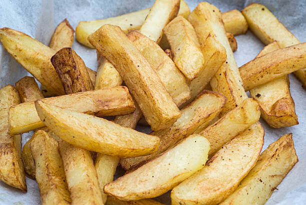 istock Hand cut tasty potato chips fries 498552127