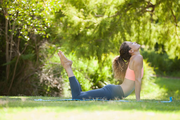 istock Fit woman stretching in cobra pose 498553245
