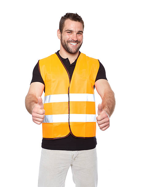 istock Portrait of smiling worker in a reflective vest 498553479