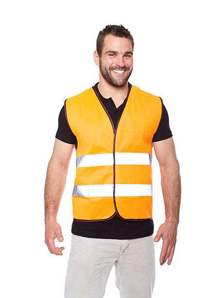 istock Portrait of smiling worker in a reflective vest 498553495